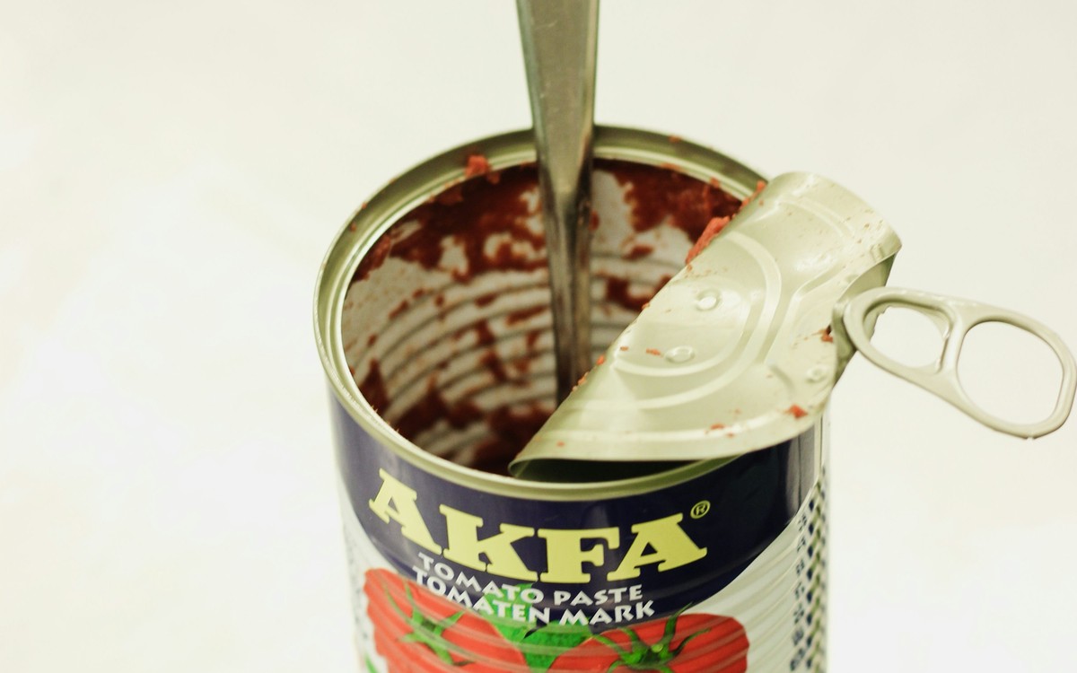 Open canned food on a kitchen surface, representing convenient pantry staples