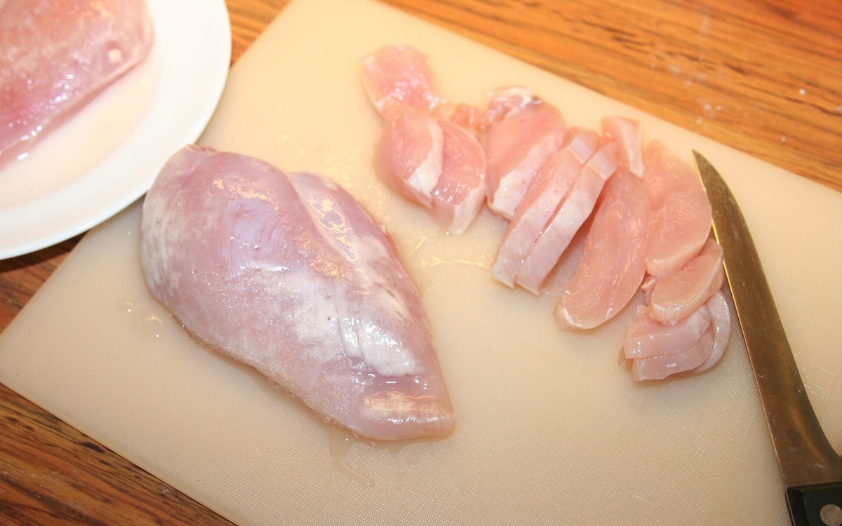 Raw chicken prepared for safe cold storage in the refrigerator