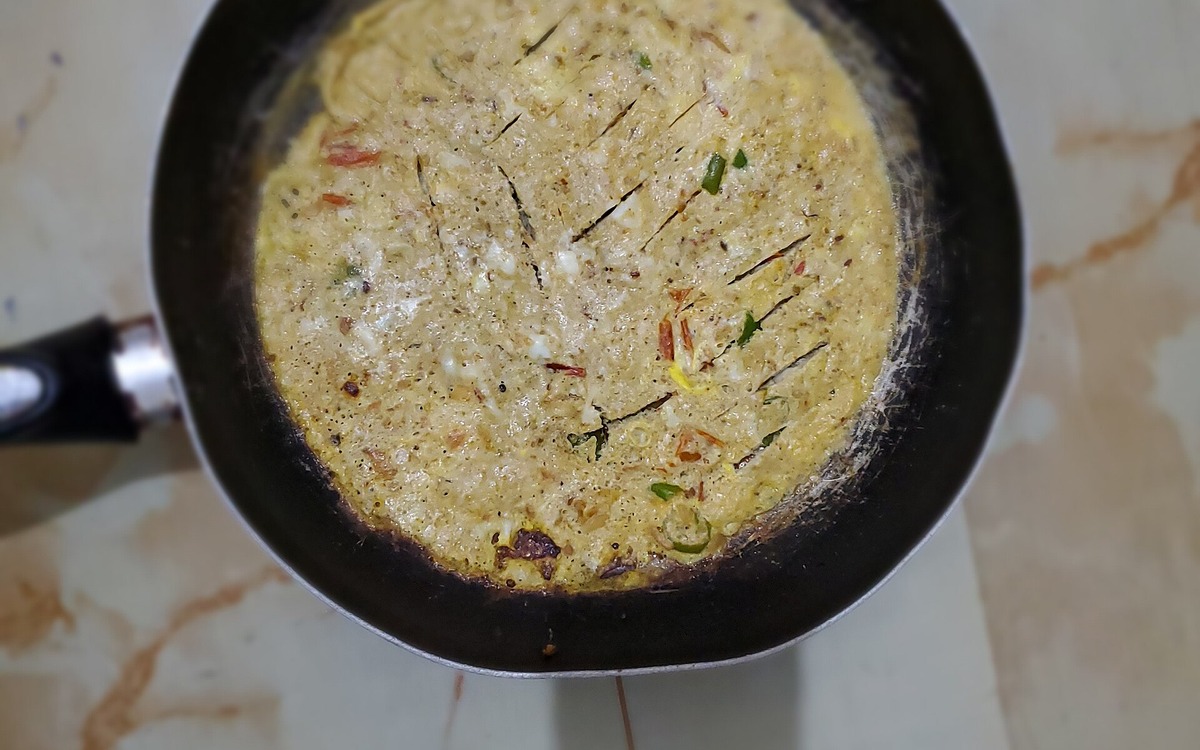 Eggs cooking thoroughly in a pan