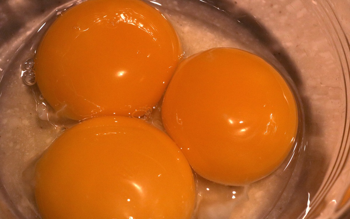 Eggs being prepared for cooking in a home kitchen