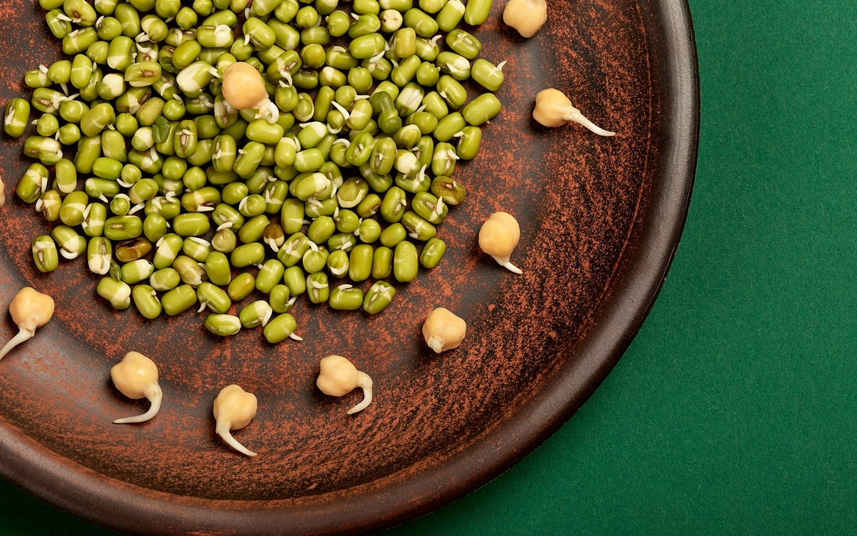 A simple bowl of green peas ready to add to a quick meal