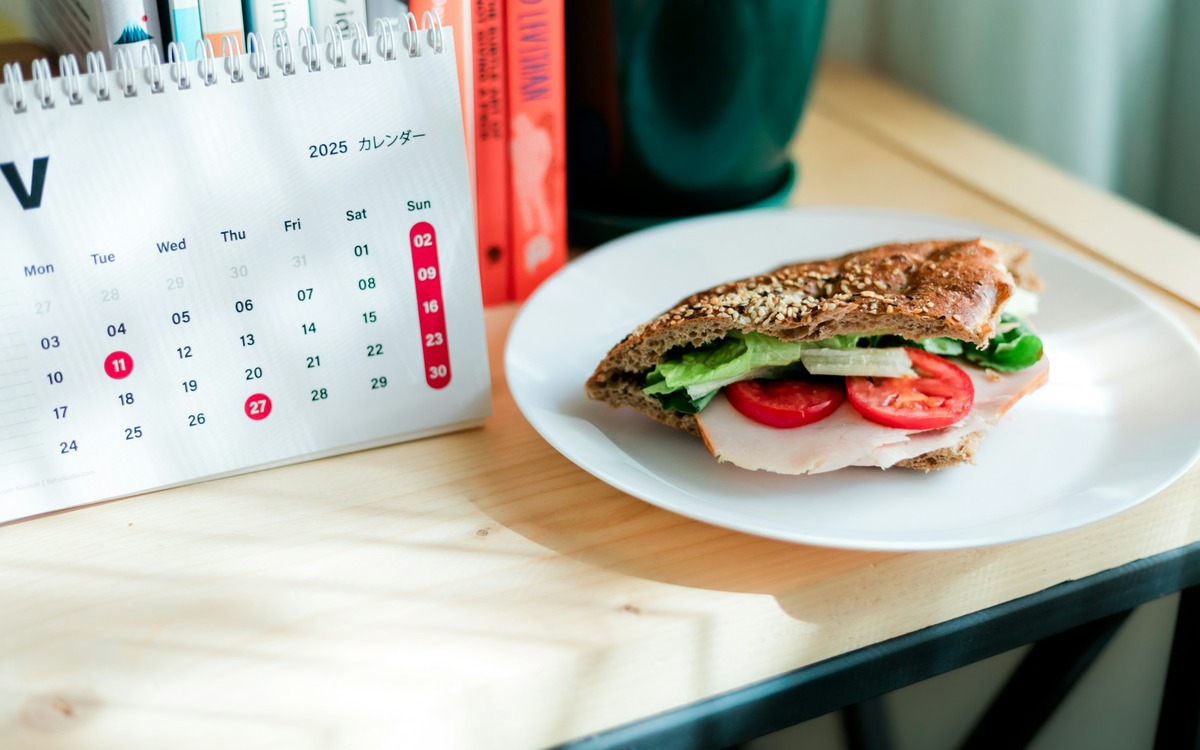 Whole grain sandwich with vegetables on a table