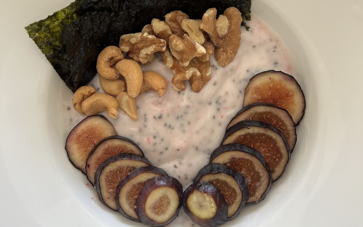 Yogurt bowl with fruit and nuts showing a practical way to use yogurt in a meal